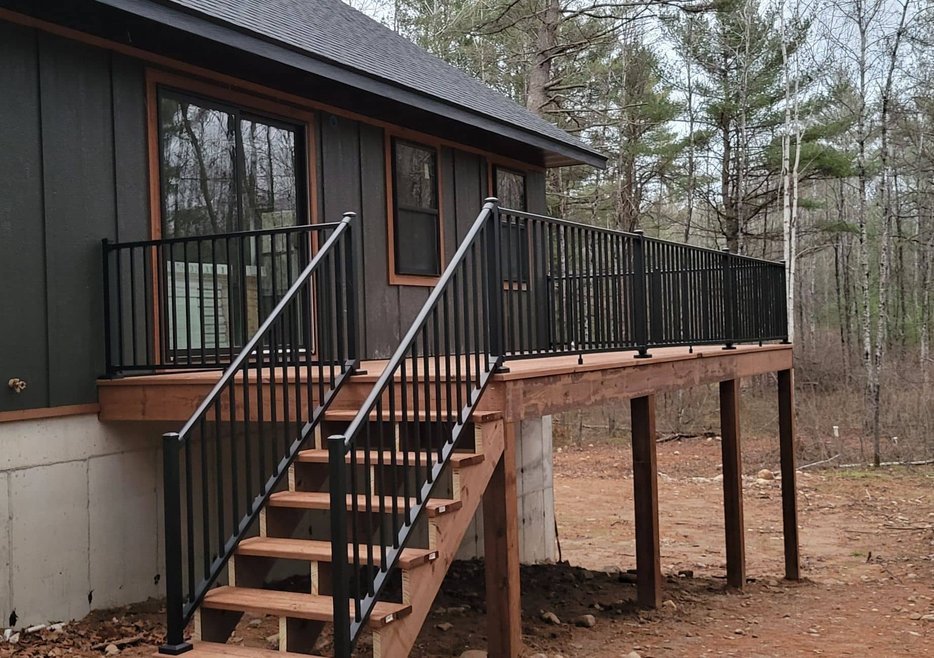 Red wooden home in Wisconsin winter, siding and exterior
